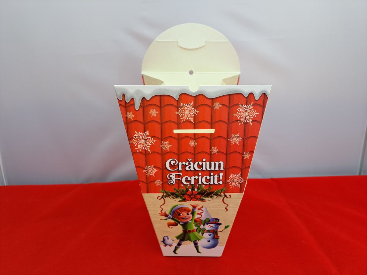 Christmas box in the shape of a house